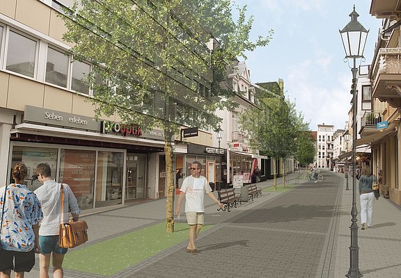 Besucherinnen und Besucher spazieren durch die neue Poststraße.