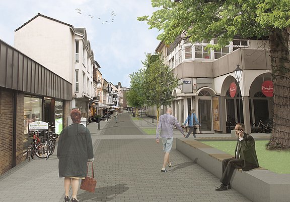 Besucherinnen und Besucher spazieren durch die neue Poststraße.